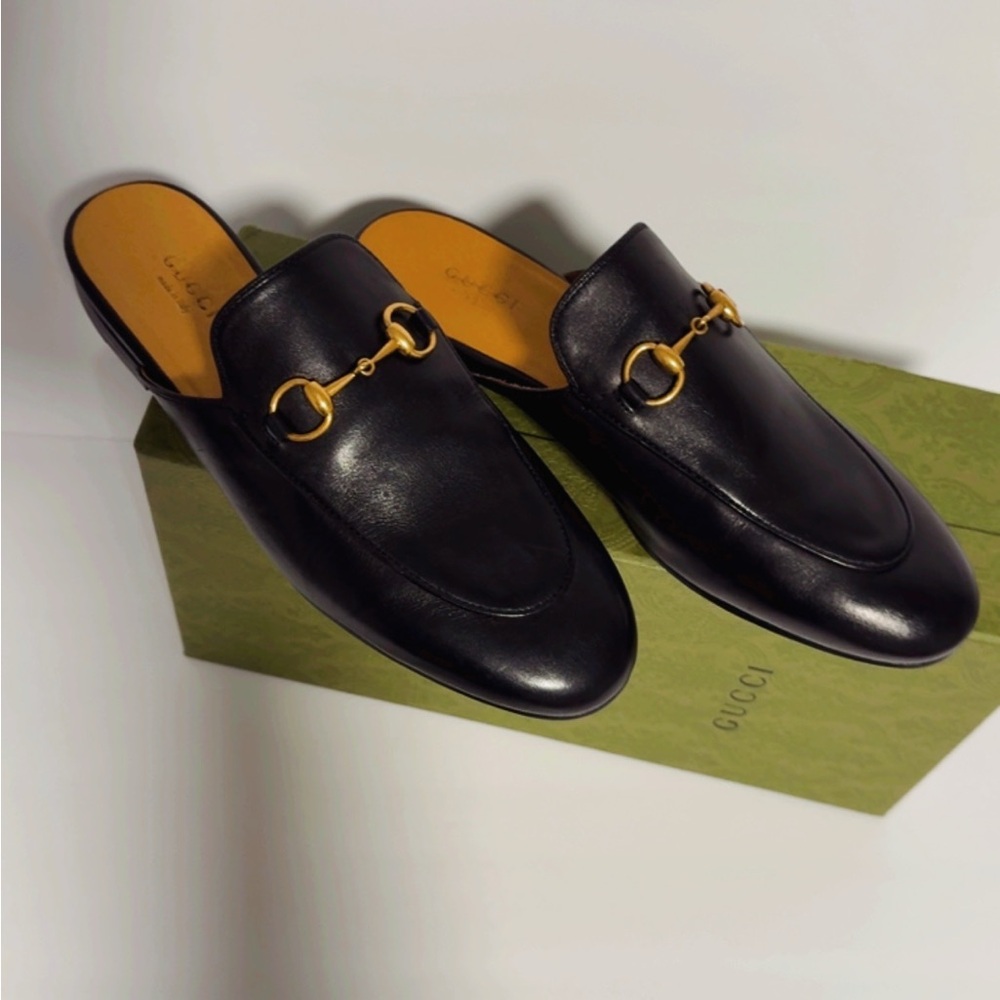 Gucci Black Leather Mules with Gold Accents